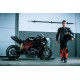 motorcycle racer standing next to Energica EGO+ 