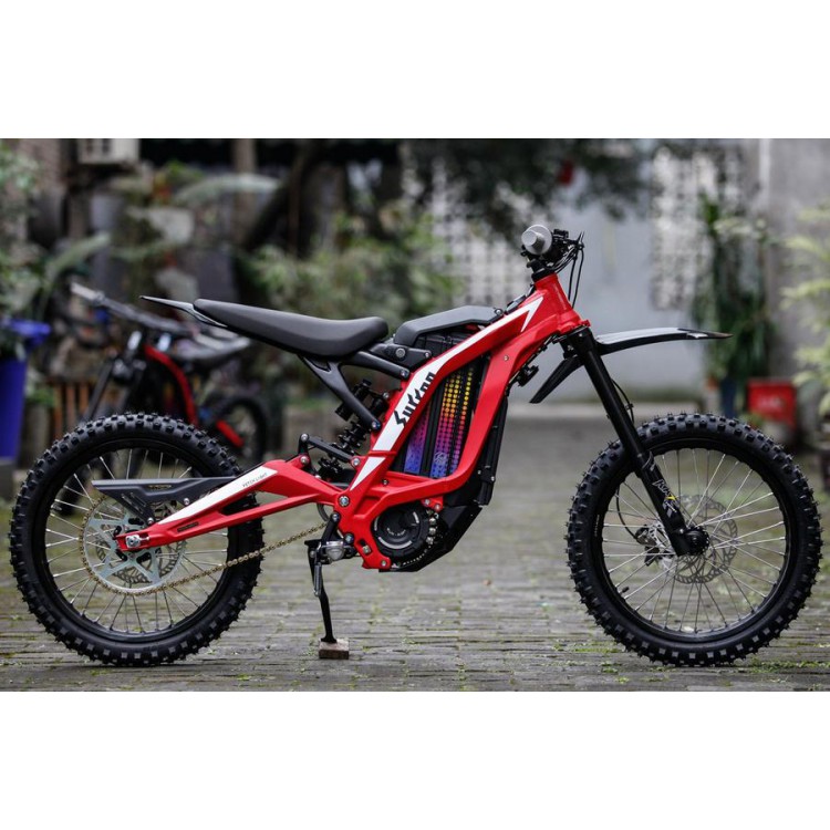 red sur-ron lb x youth electric dirt bike